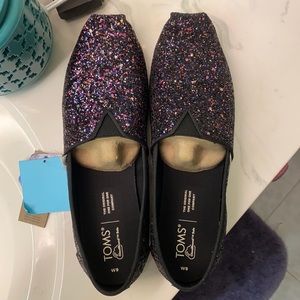 Brand new in box black glitter Tom’s
